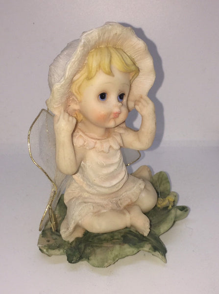 Vintage Garden Fairy in a Sitting Position