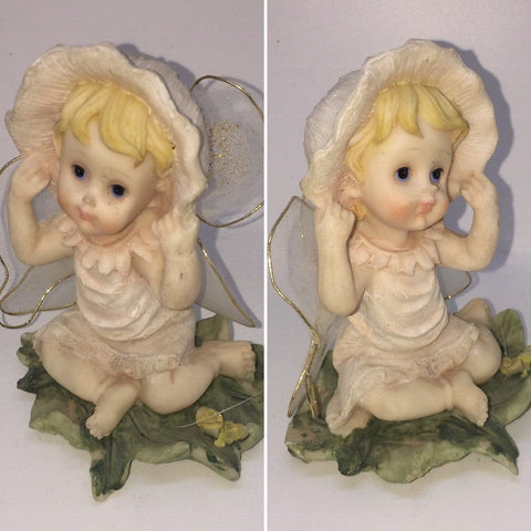 Vintage Garden Fairy in a Sitting Position