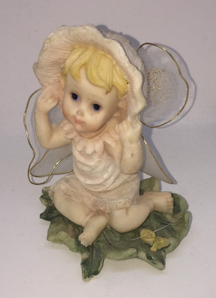 Vintage Garden Fairy in a Sitting Position