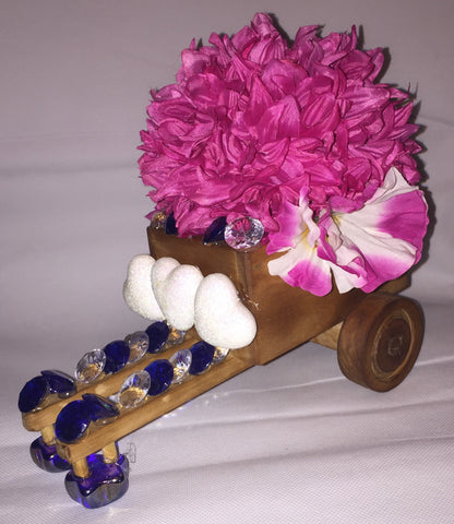 Handcraft Beautifully Decorated Floral Decor in a Wooden Cart