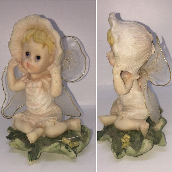 Vintage Garden Fairy in a Sitting Position