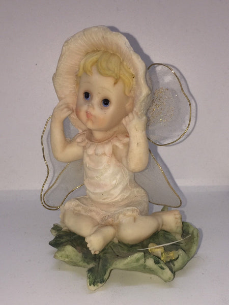 Vintage Garden Fairy in a Sitting Position