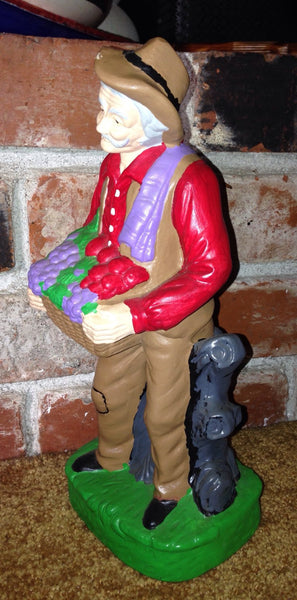 Ceramic Handmade Farmer Holding a Basket of Fruits