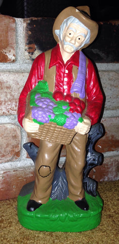 Ceramic Handmade Farmer Holding a Basket of Fruits